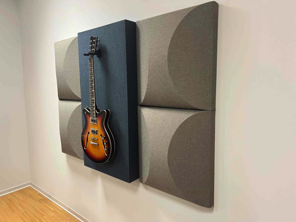 Supporto da chitarra e diffusione del suono.