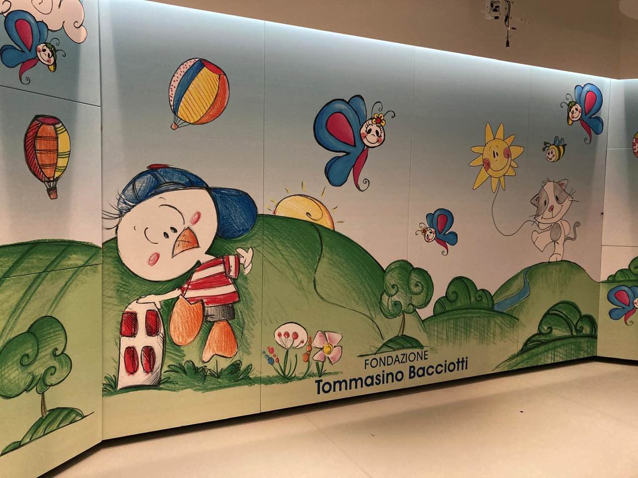 Pannelli fonoassorbenti con stampa personalizzata AkuPan ART per la sala multimediale Care Lab Don Gnocchi Firenze